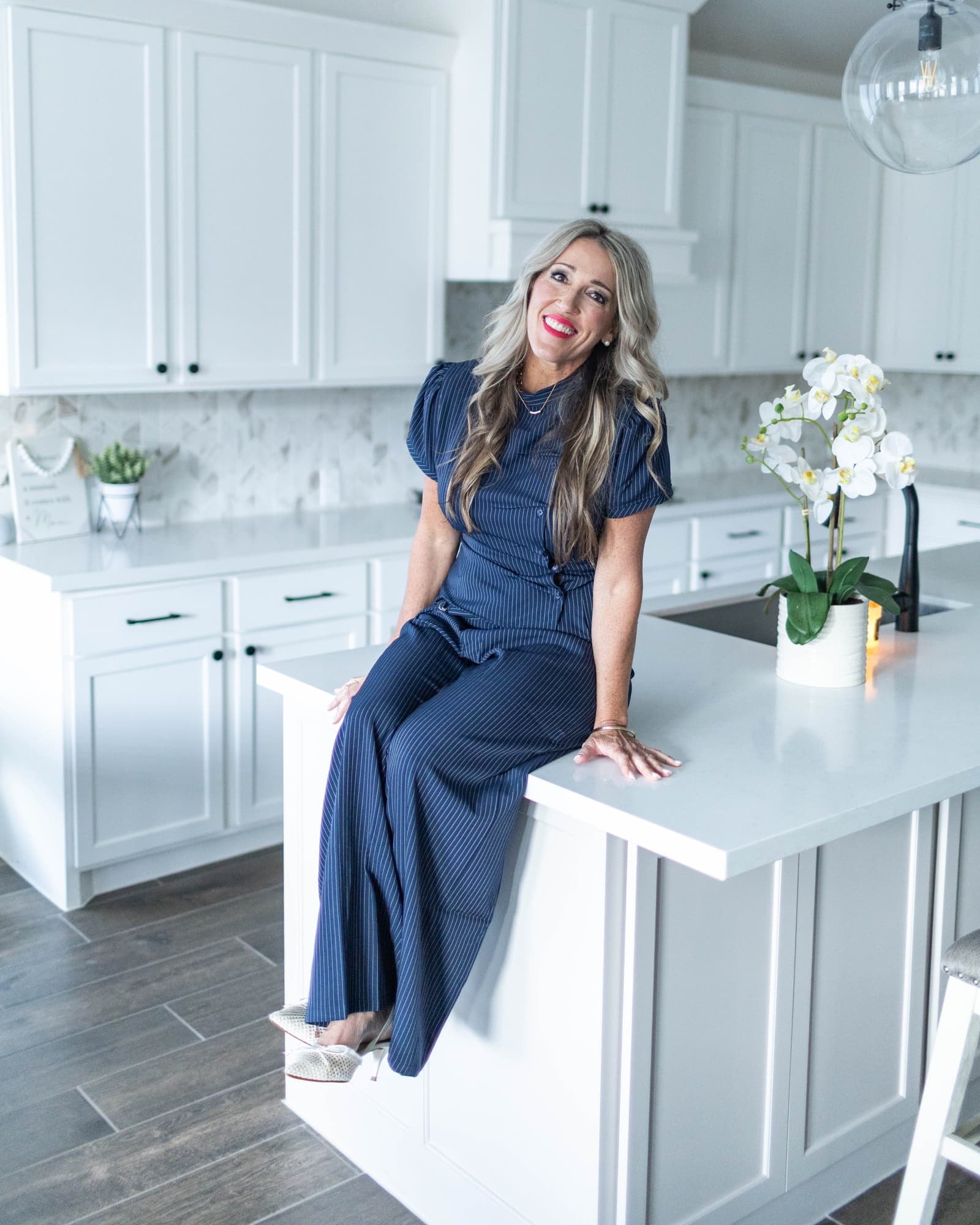 Dr. Erin Hudson in the kitchen of a property